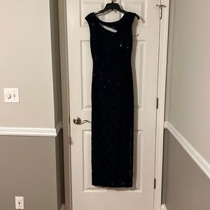 Mother of the bride/groom gown. No rips, tears, snags etc.  color is navy blue
